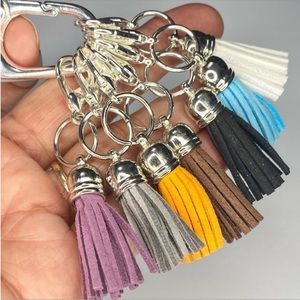Suede tassel stitch markers for knitting and crochet. Doubles as purse charms